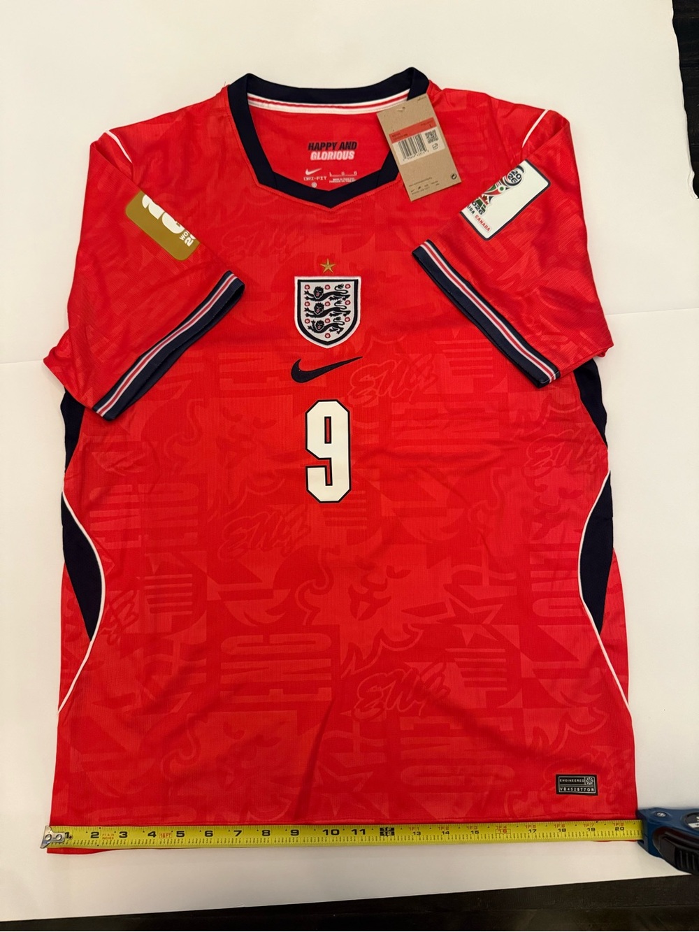 Nike England Men's Red #9 Football Jersey with Navy Trim